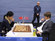 Hou Yifan vs. Magnus Carlsen, Day 9, 2013 Tata Steel Chess Tournament, Photo Courtesy Official Website www.tatasteelchess.com